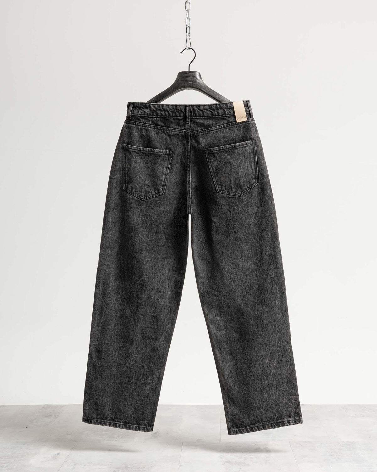 Jeans baggy nero con legature