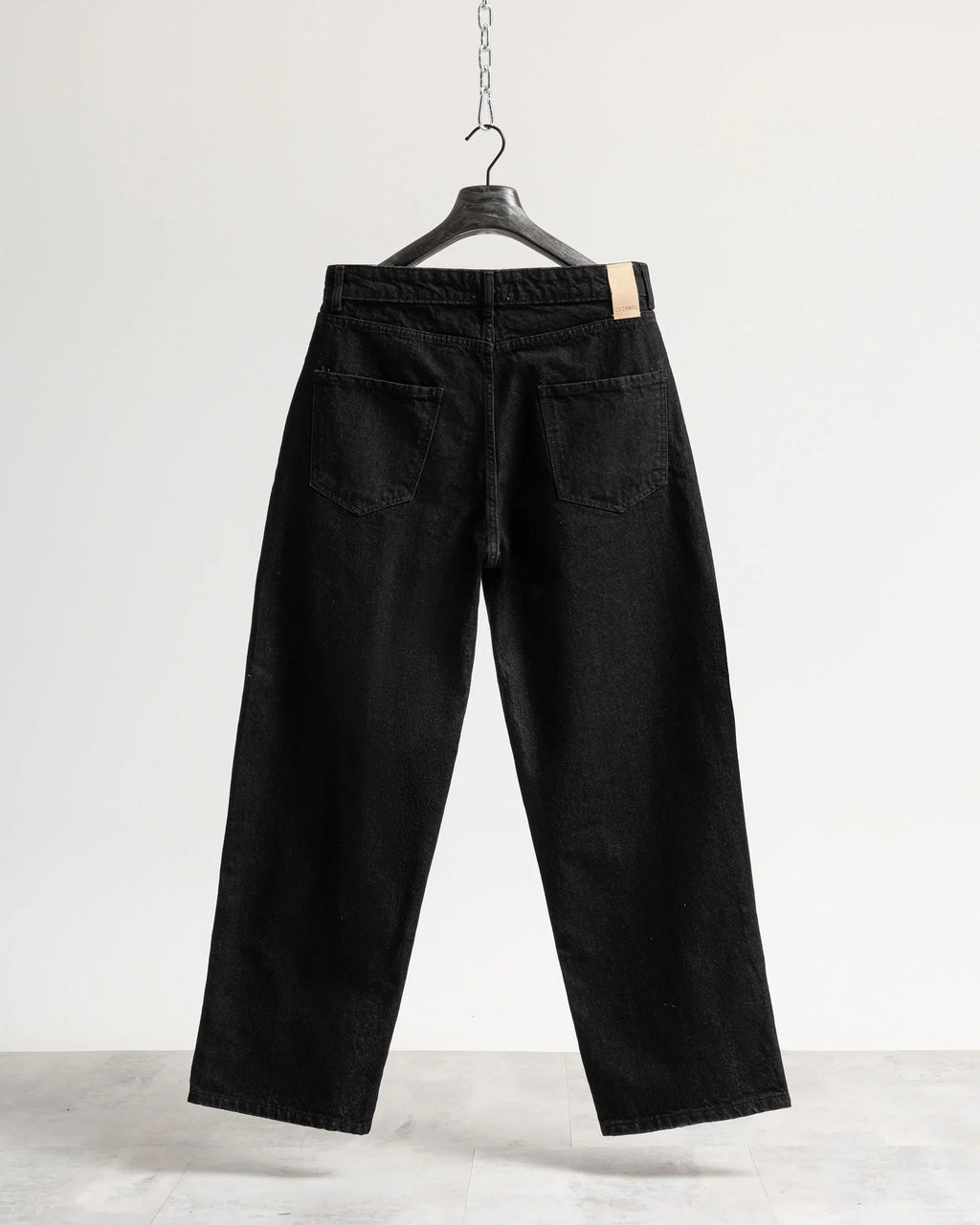 Jeans baggy nero resinato