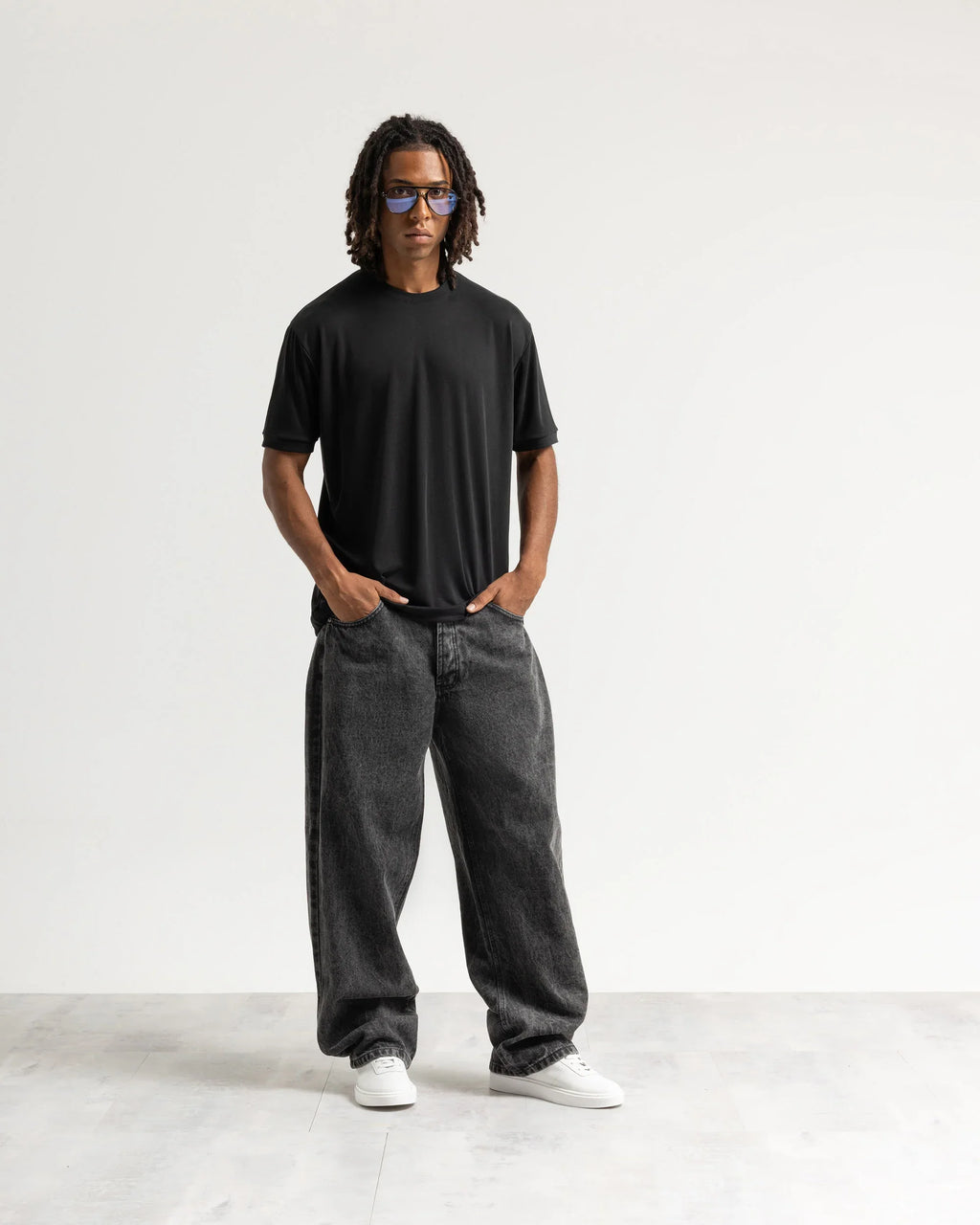 Jeans baggy nero con legature