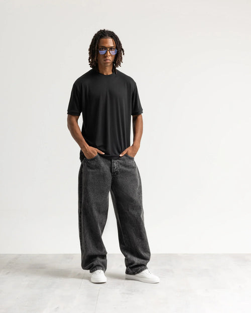 Jeans baggy nero con legature