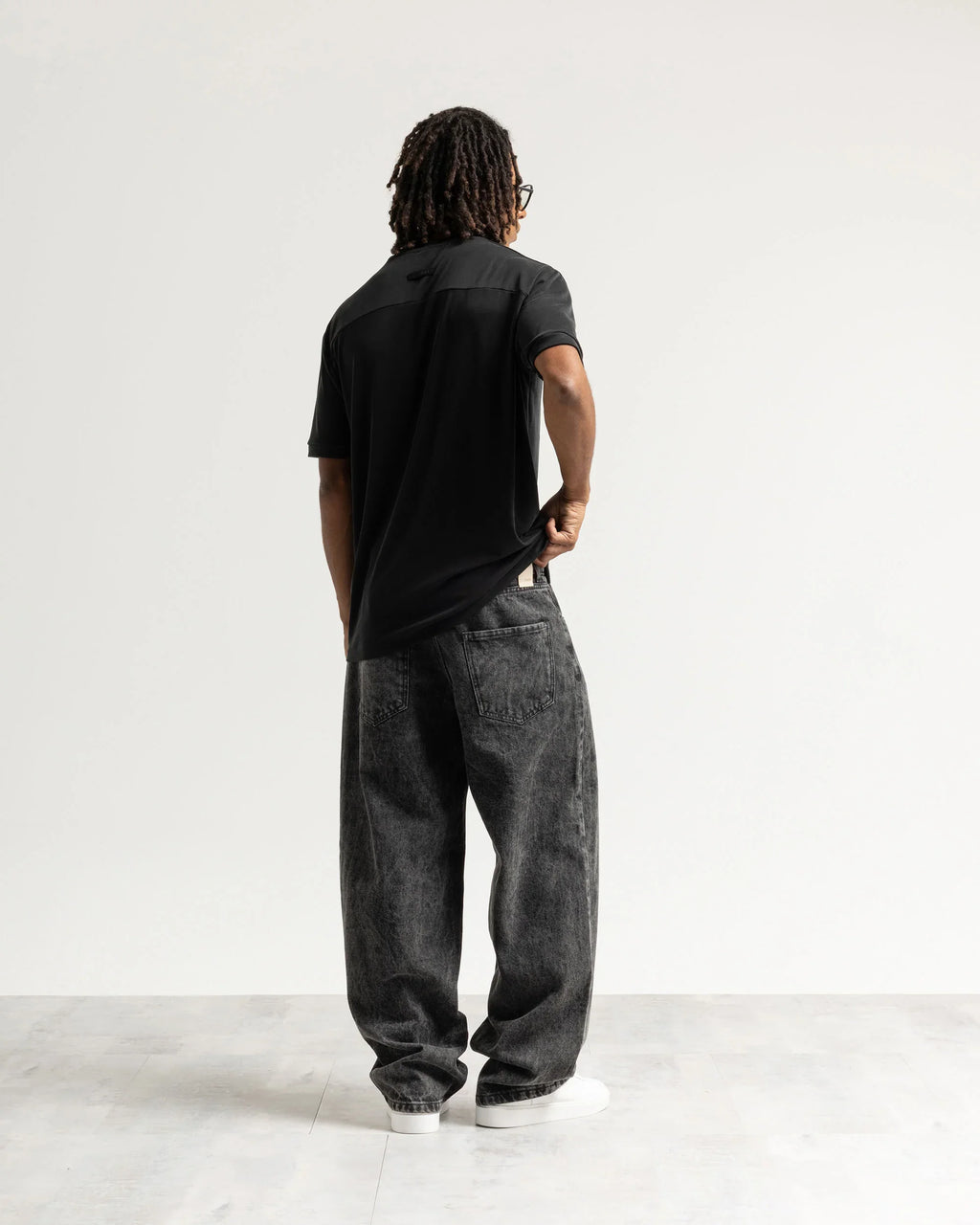 Jeans baggy nero con legature