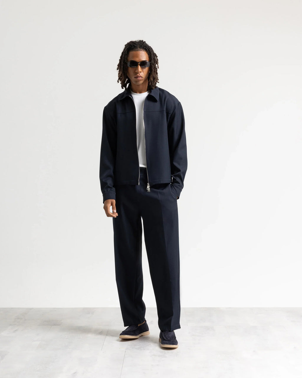 Pantalone fondo ampio tessuto classico